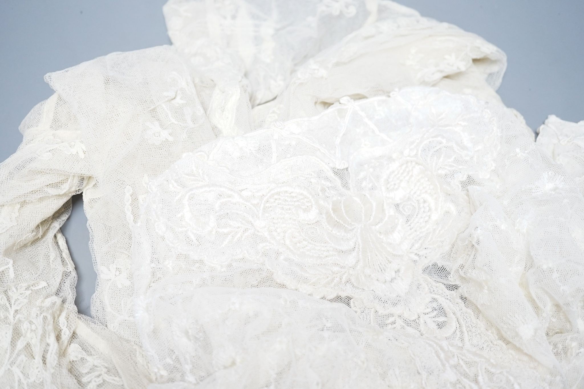 Three Edwardian lace blouses, a lace collar and all-in-one under garments